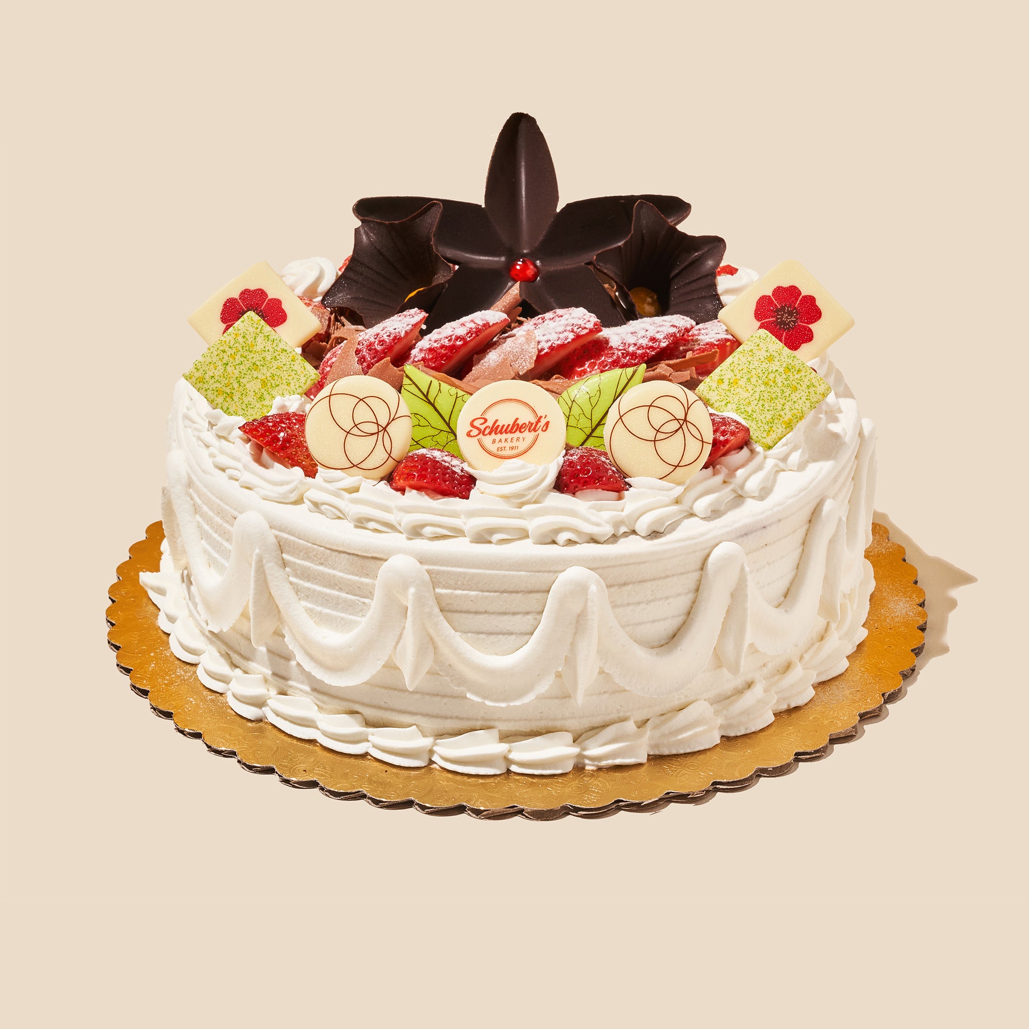 chocolate mousse cake with whipped cream and strawberries